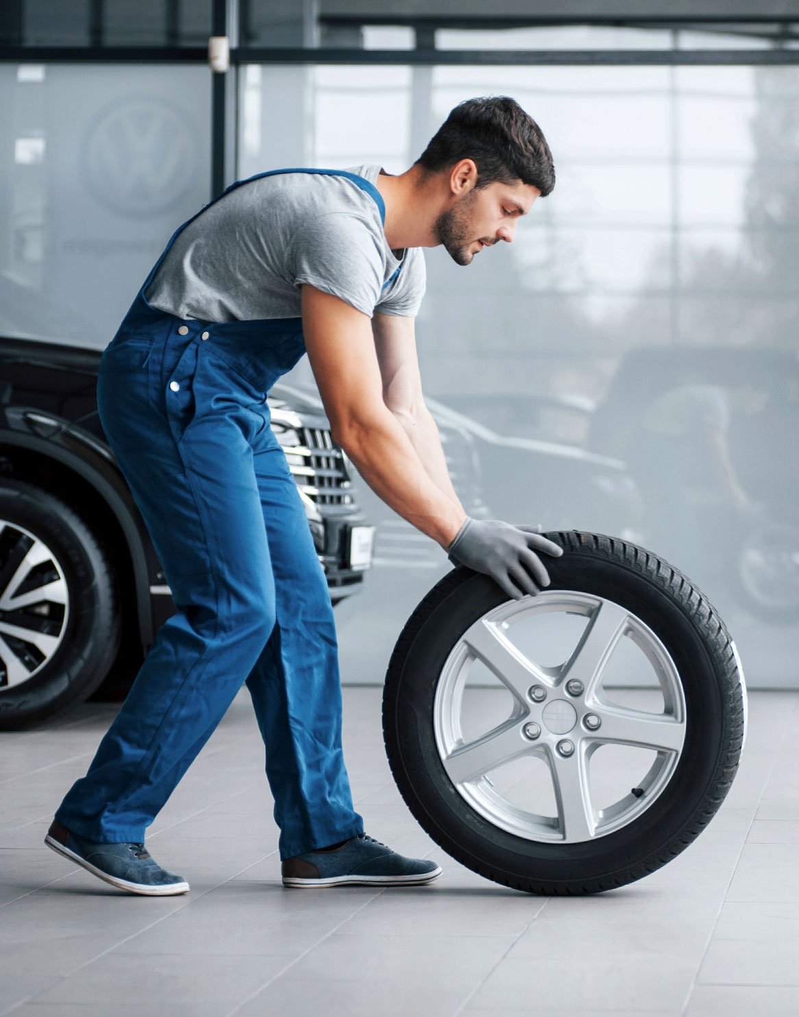 Man Moving Tire 1 Man Moving Tire 1